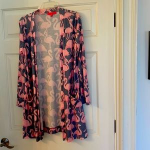 Cute kimono with pink flamingos on light gray background.